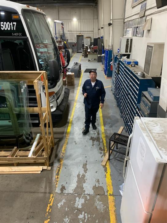 A man standing in a warehouse