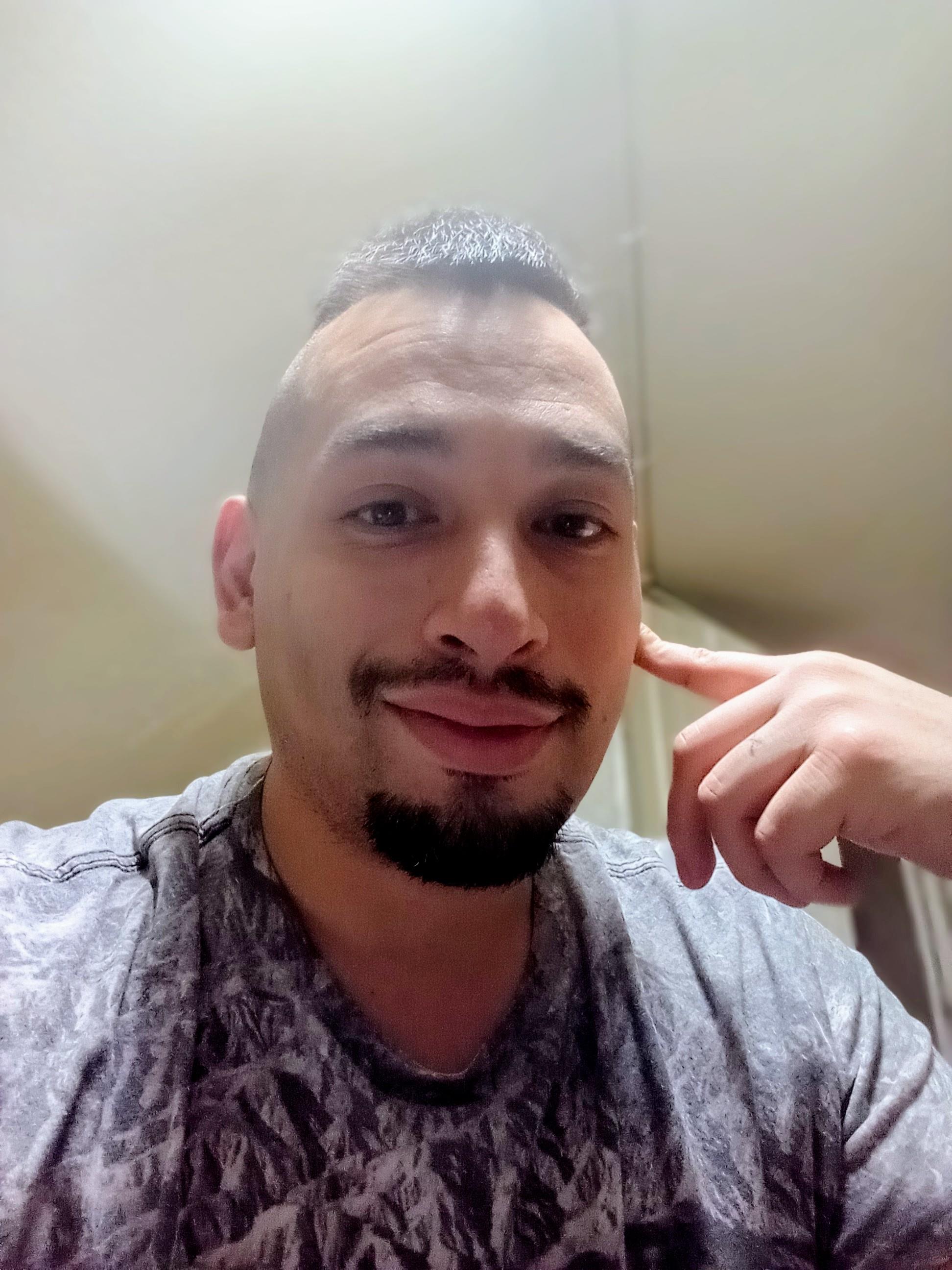 A man with a beard and mustache