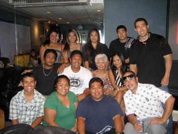 A group of friends and family enjoys quality time together in a lively atmosphere.