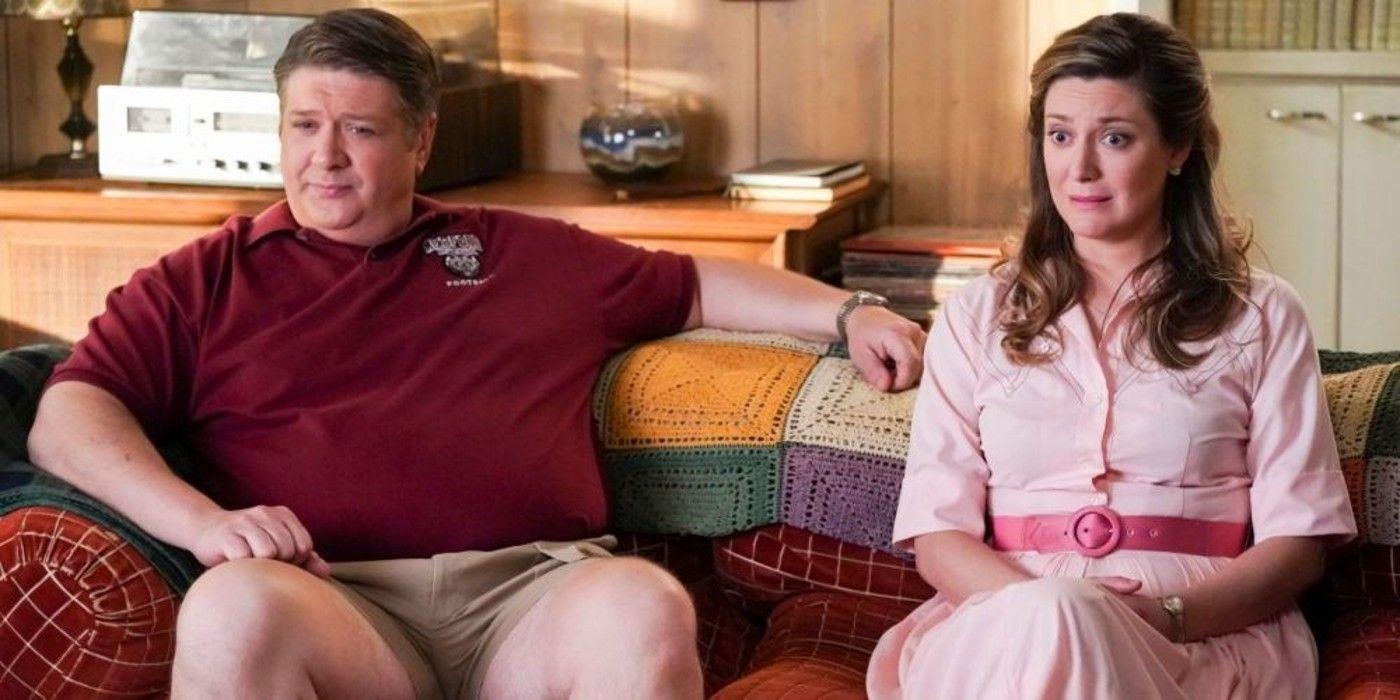 A man and woman sitting on a couch