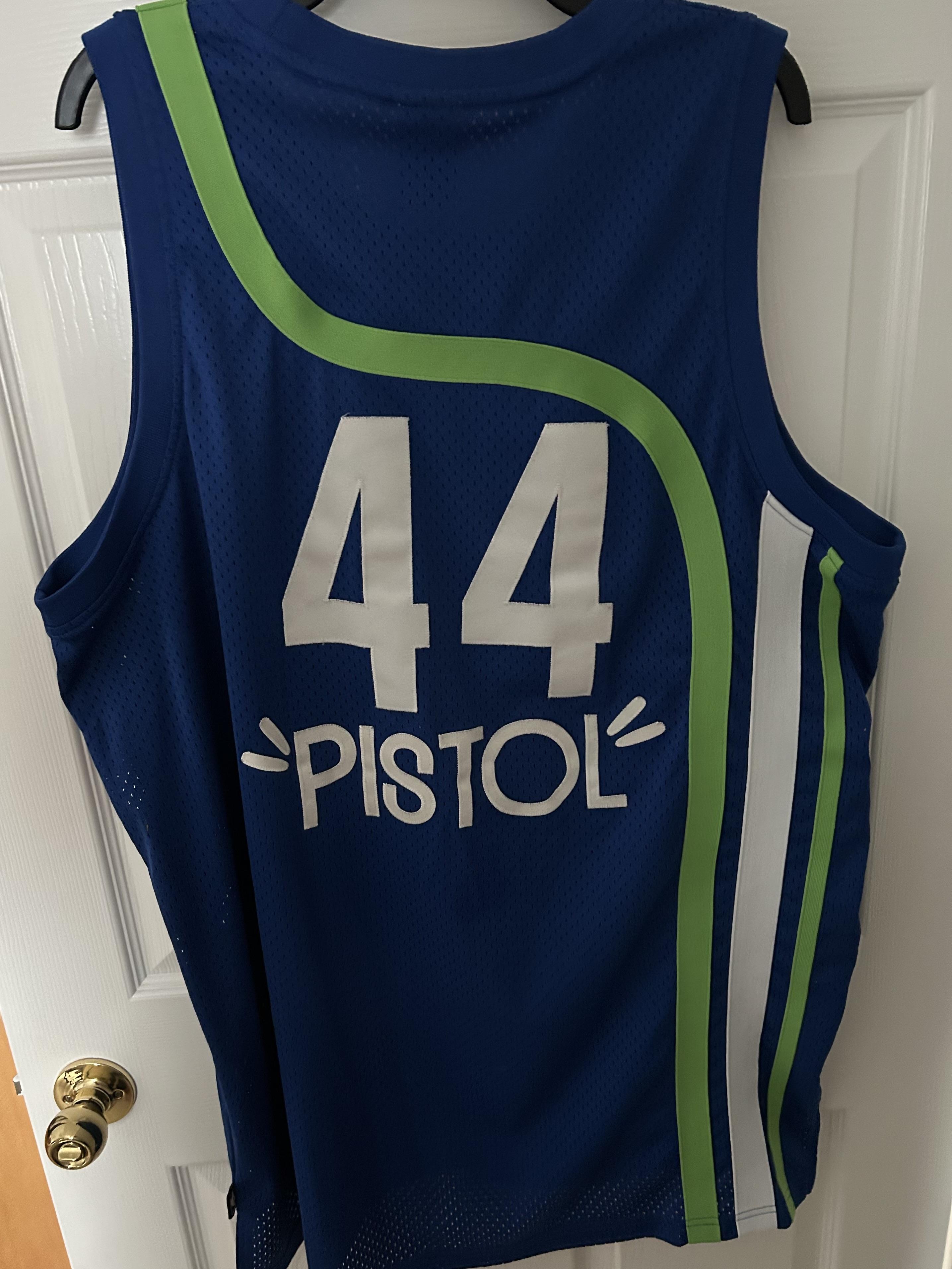 Blue retro sports jersey with green accents, number 44, and 'Pistol' on the back.