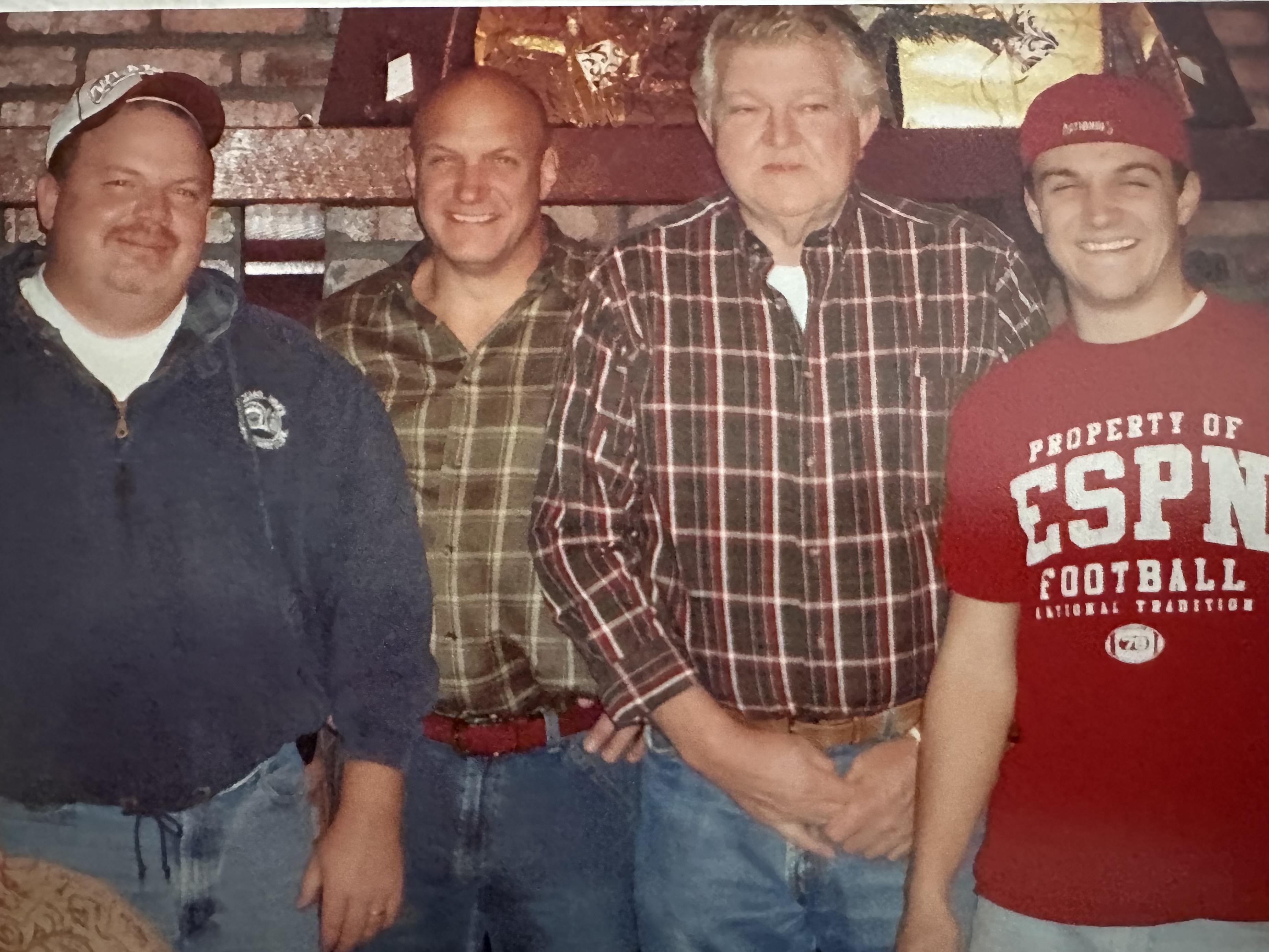 Friends enjoy each other's company in a warm setting, laughter and smiles filling the room.