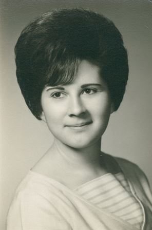 A woman with a large haircut