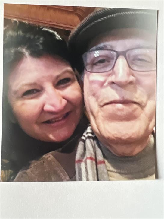 A man and woman taking a selfie