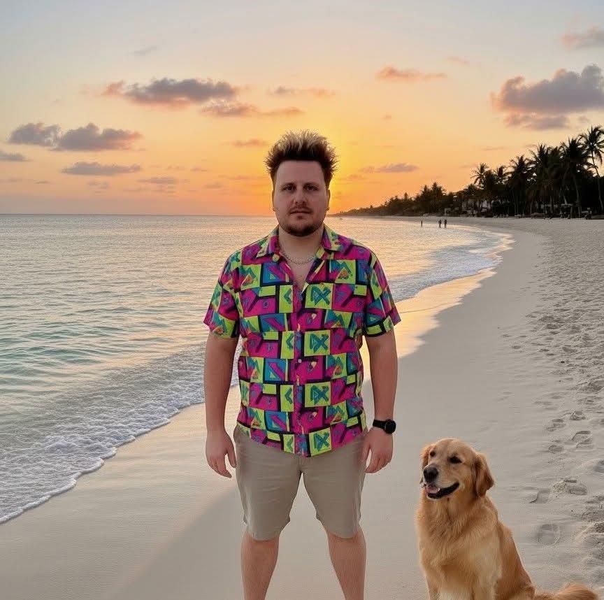 A man and dog on a beach