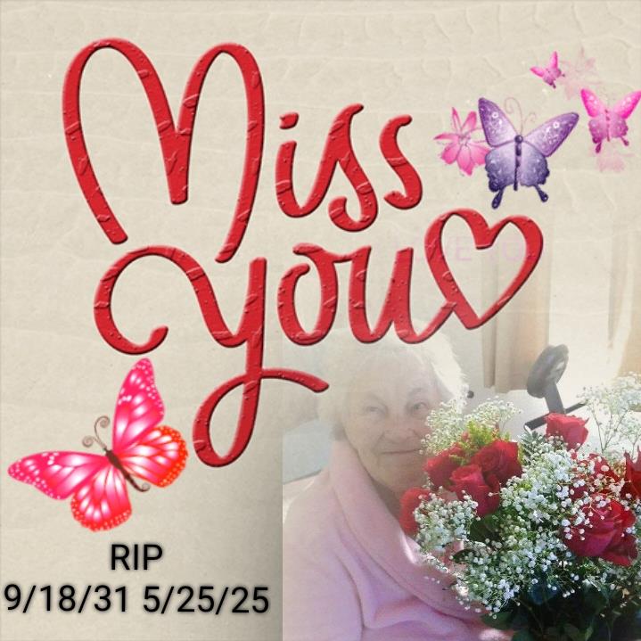 A woman holds a lovely bouquet of red roses and white flowers, with butterflies around.