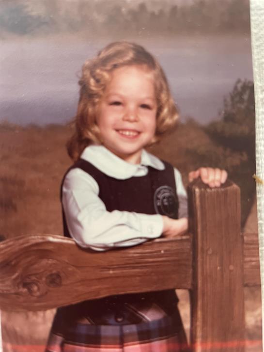 A child smiling at the camera