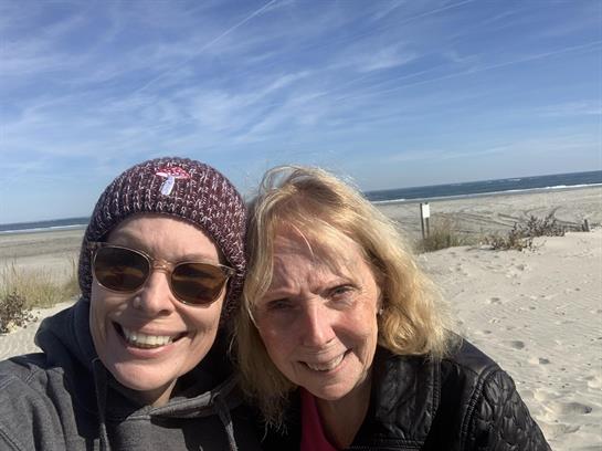 Two women taking a selfie on a beach