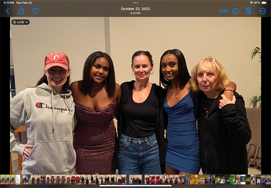 A group of women posing for a photo