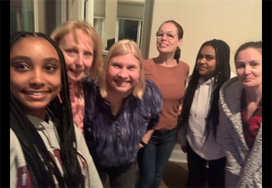 A group of women smiling