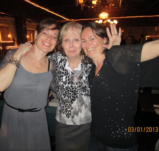 A group of women posing for a photo
