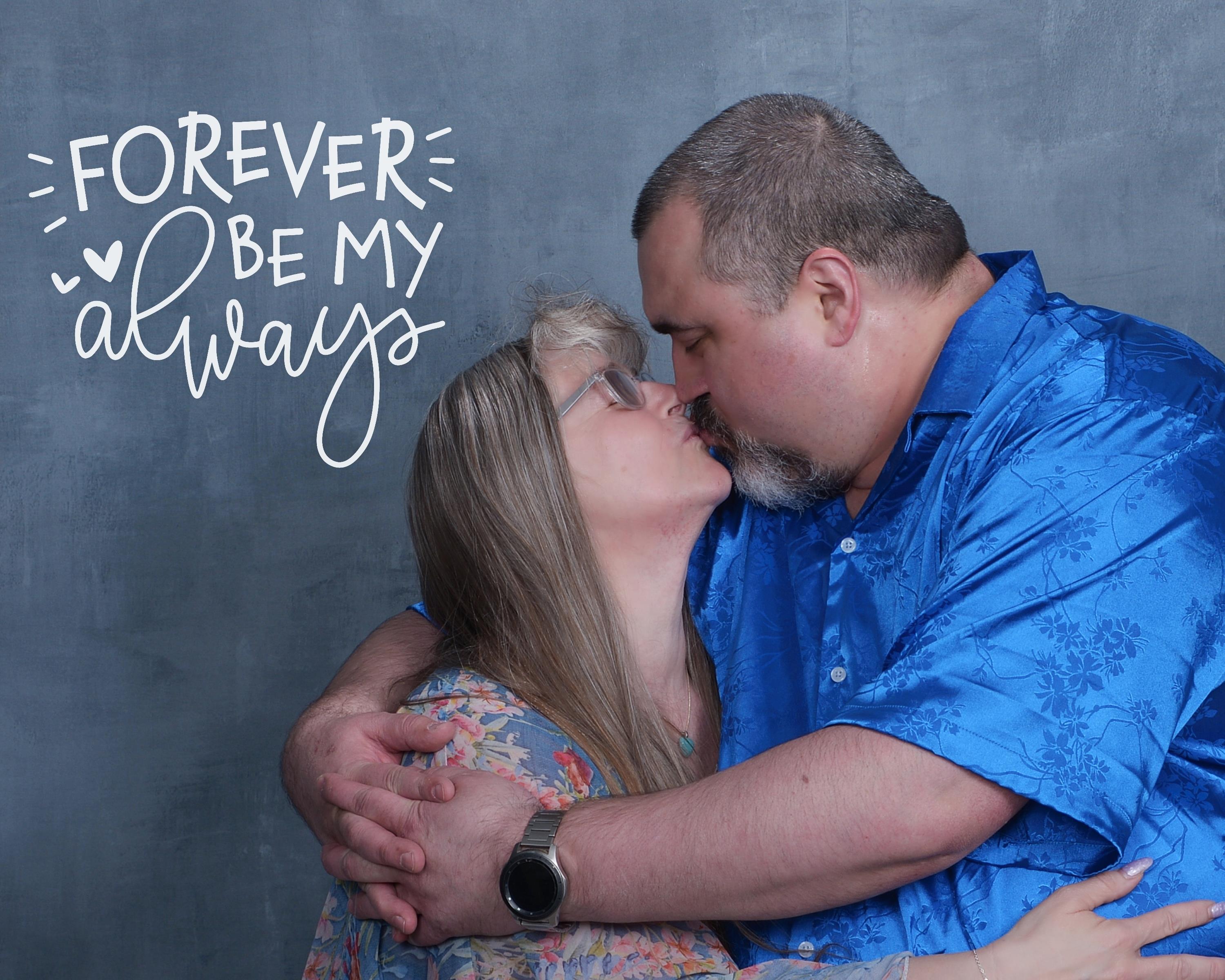 A couple shares a kiss, symbolizing their deep connection and love.