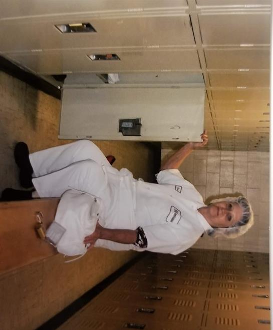 A woman in a white uniform