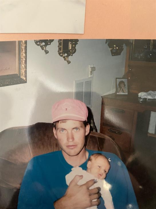 A man holding a baby