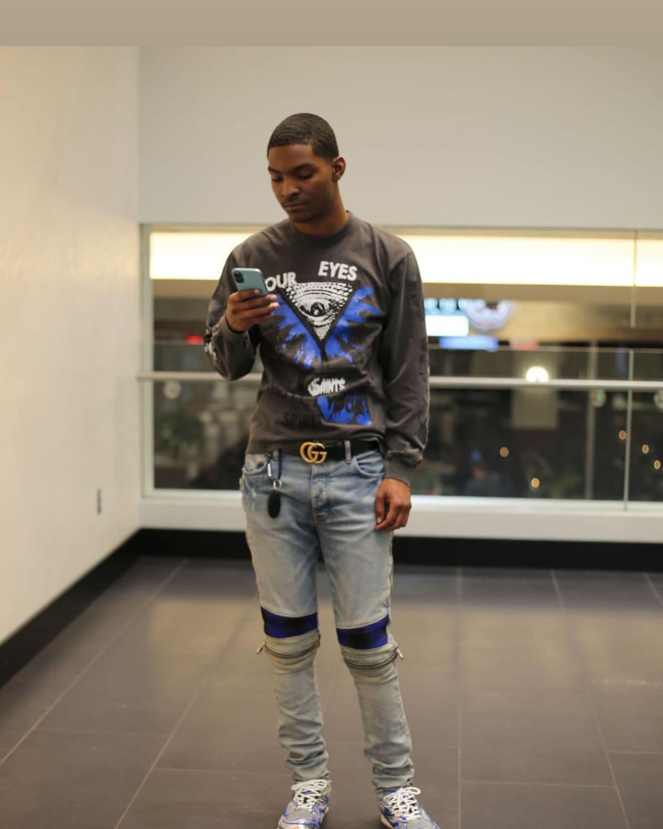 A man looking at his phone