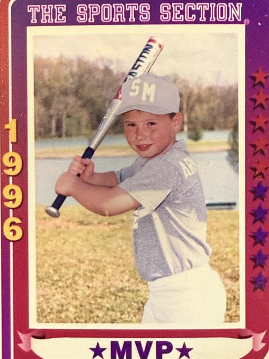 A boy holding a baseball bat