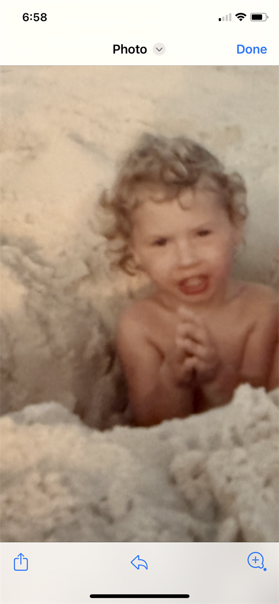 A child in a pile of snow
