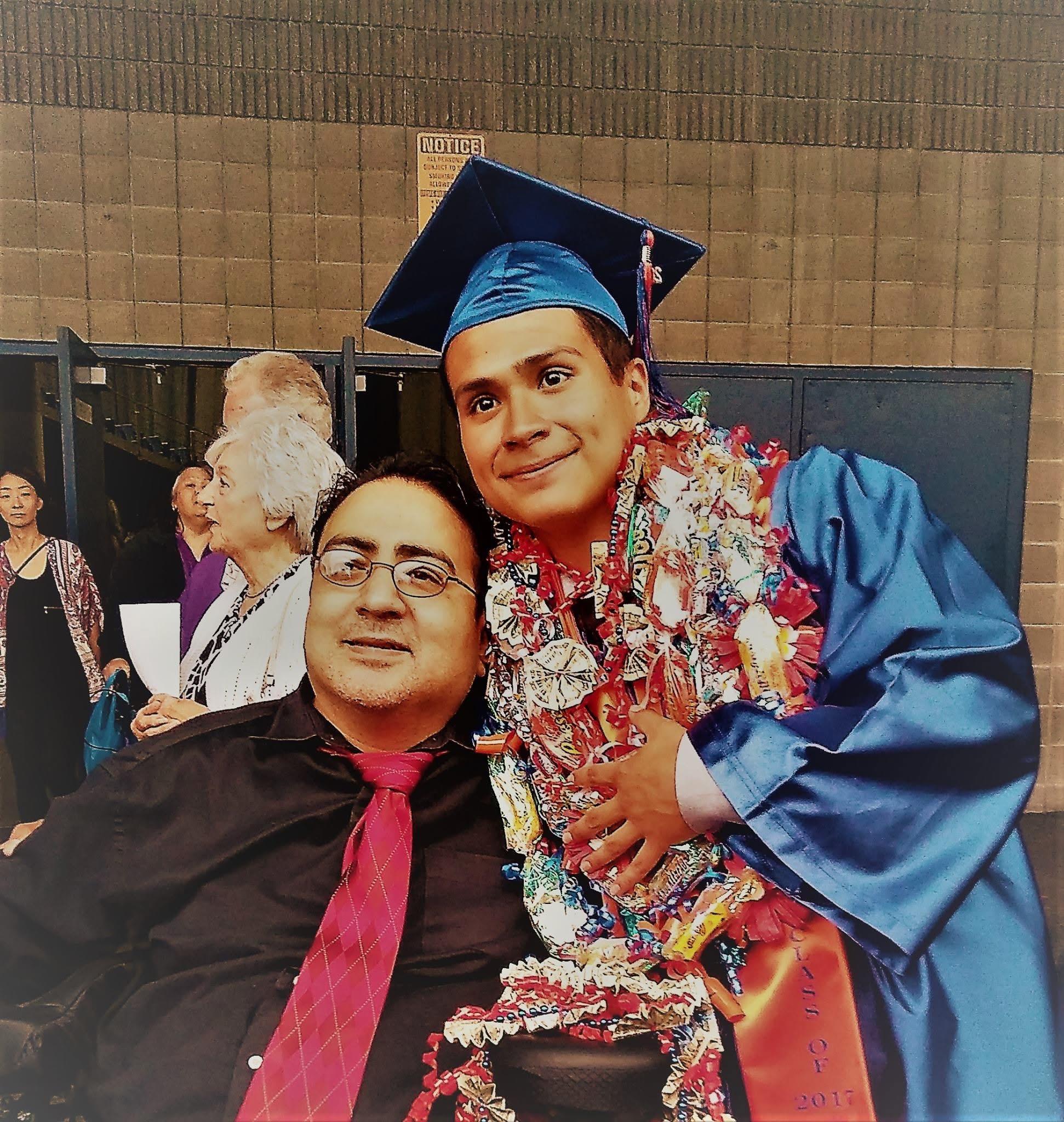 Celebration of a graduation with a joyful graduate in blue gown and family member expressing pride.