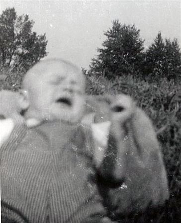 A baby in a field