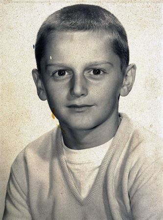 A boy in a white shirt