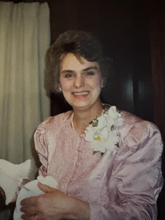 A woman in a pink dress