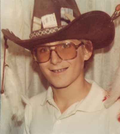 A man wearing a cowboy hat