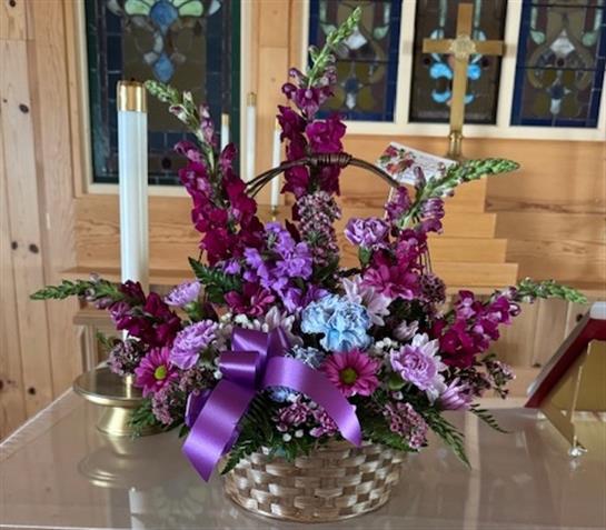 A basket of flowers on a table