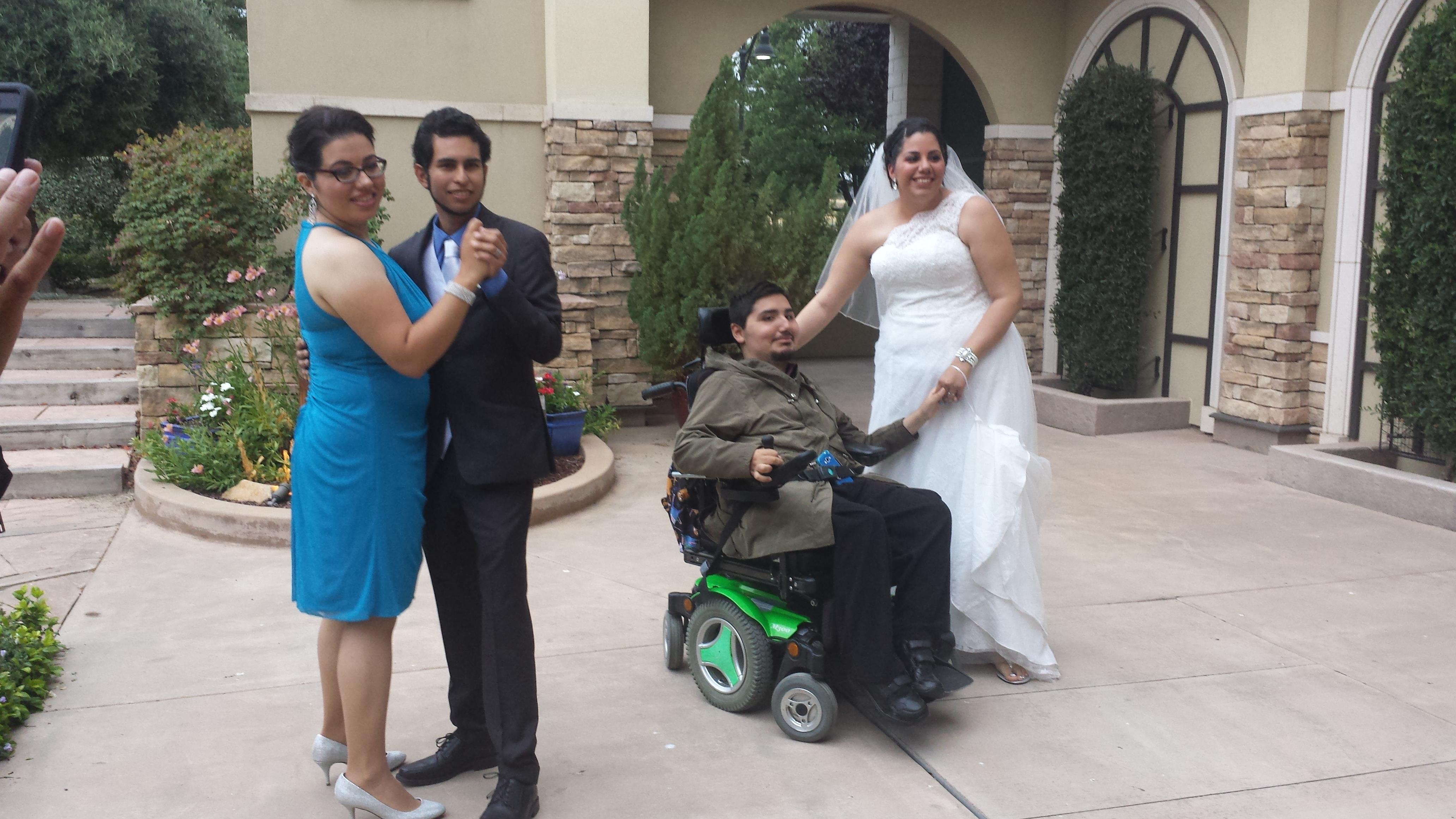 Friends gather to celebrate a wedding, featuring laughter and happiness amid beautiful surroundings.