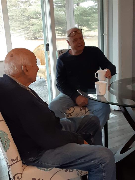 Two men sitting at a table