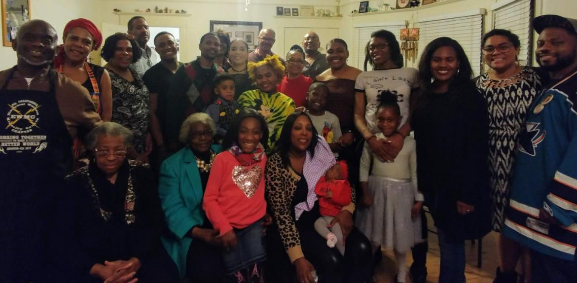 A joyful family gathering unites generations, filled with laughter in a cozy home.