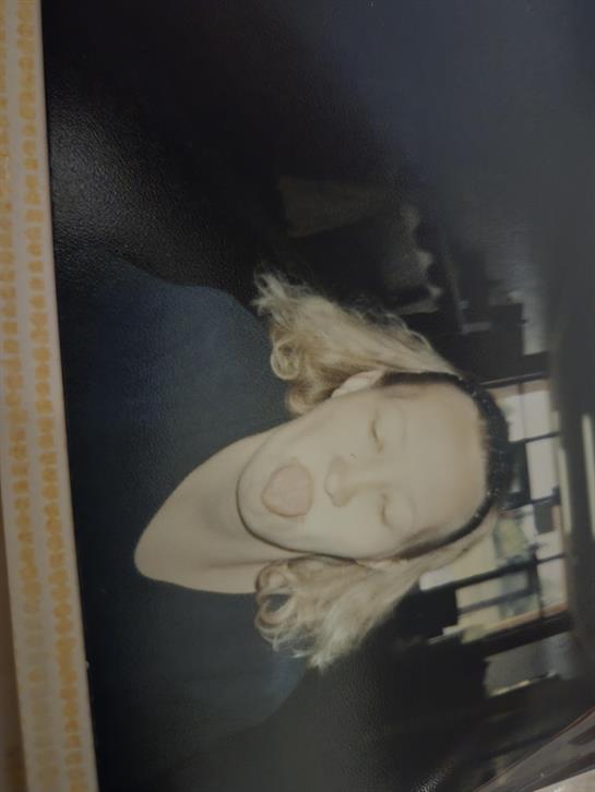 A woman with her eyes closed