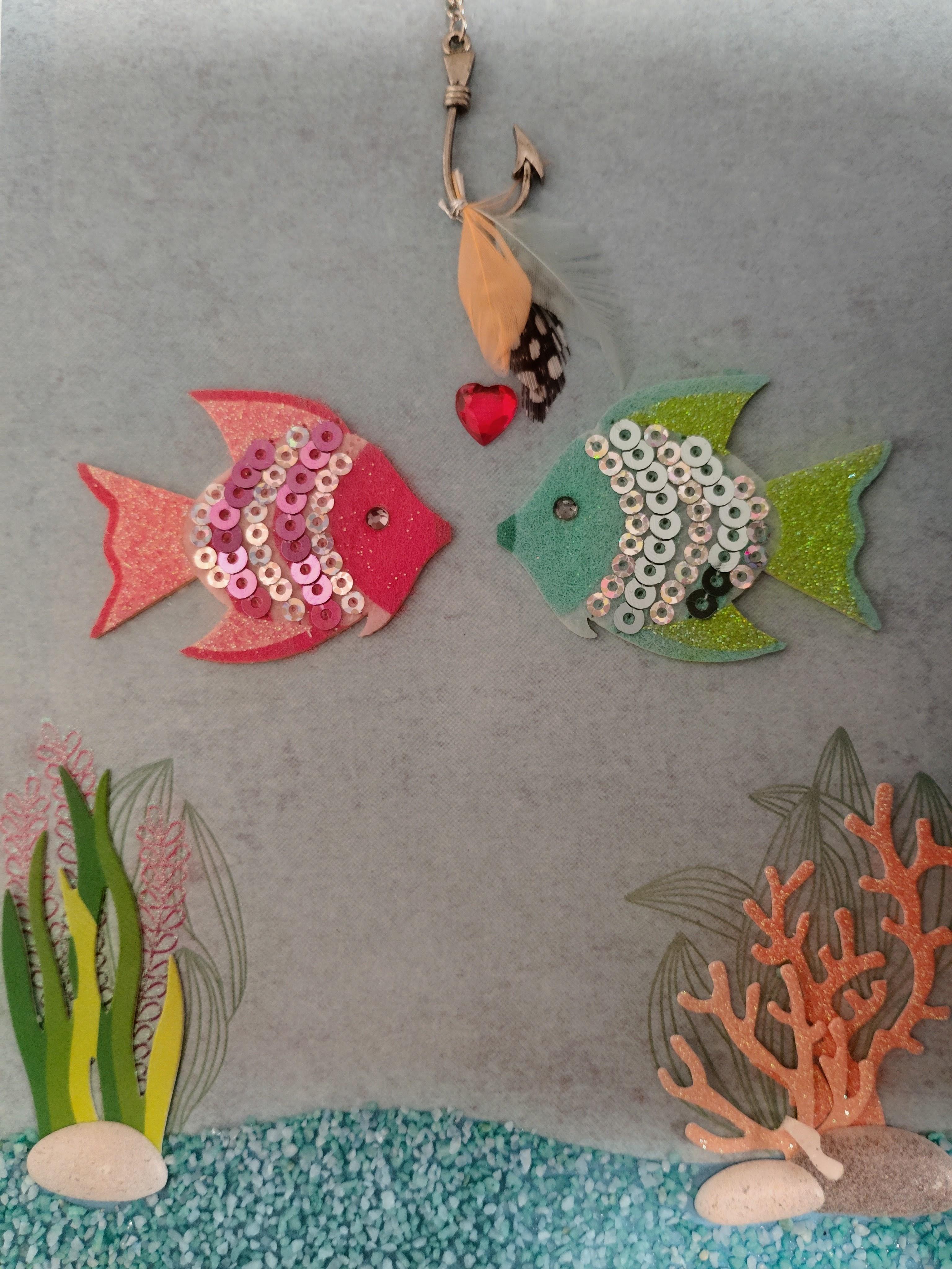 Two fish with sequins and beads
