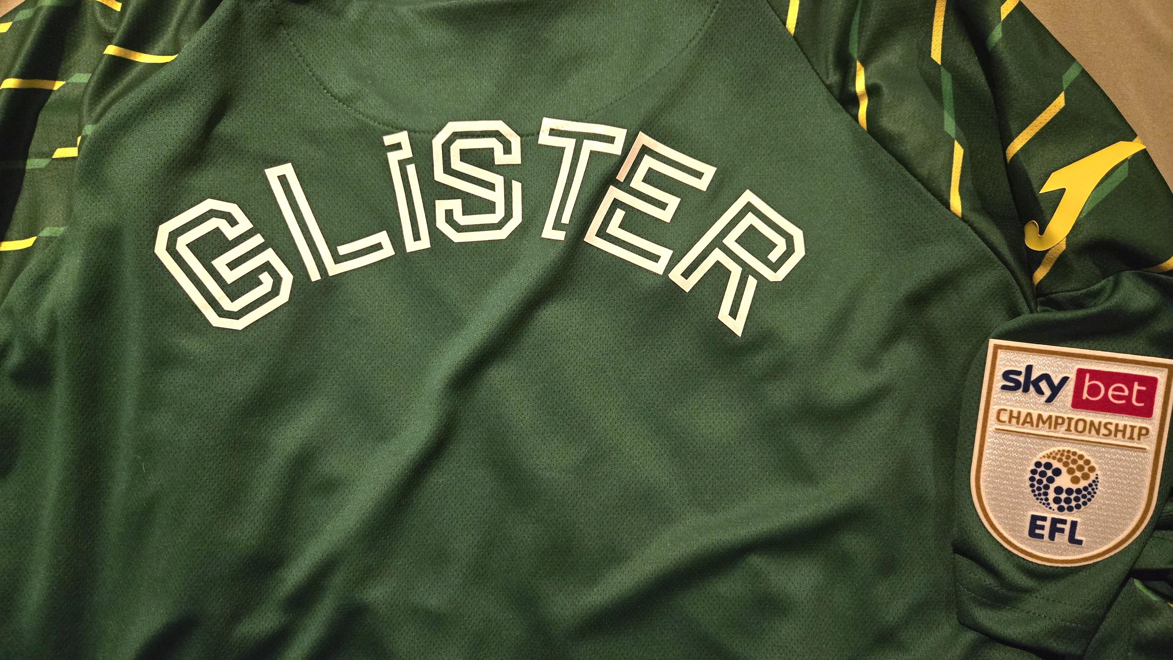 Hollister clothing shows logo design on fabric in target location with bright lighting.