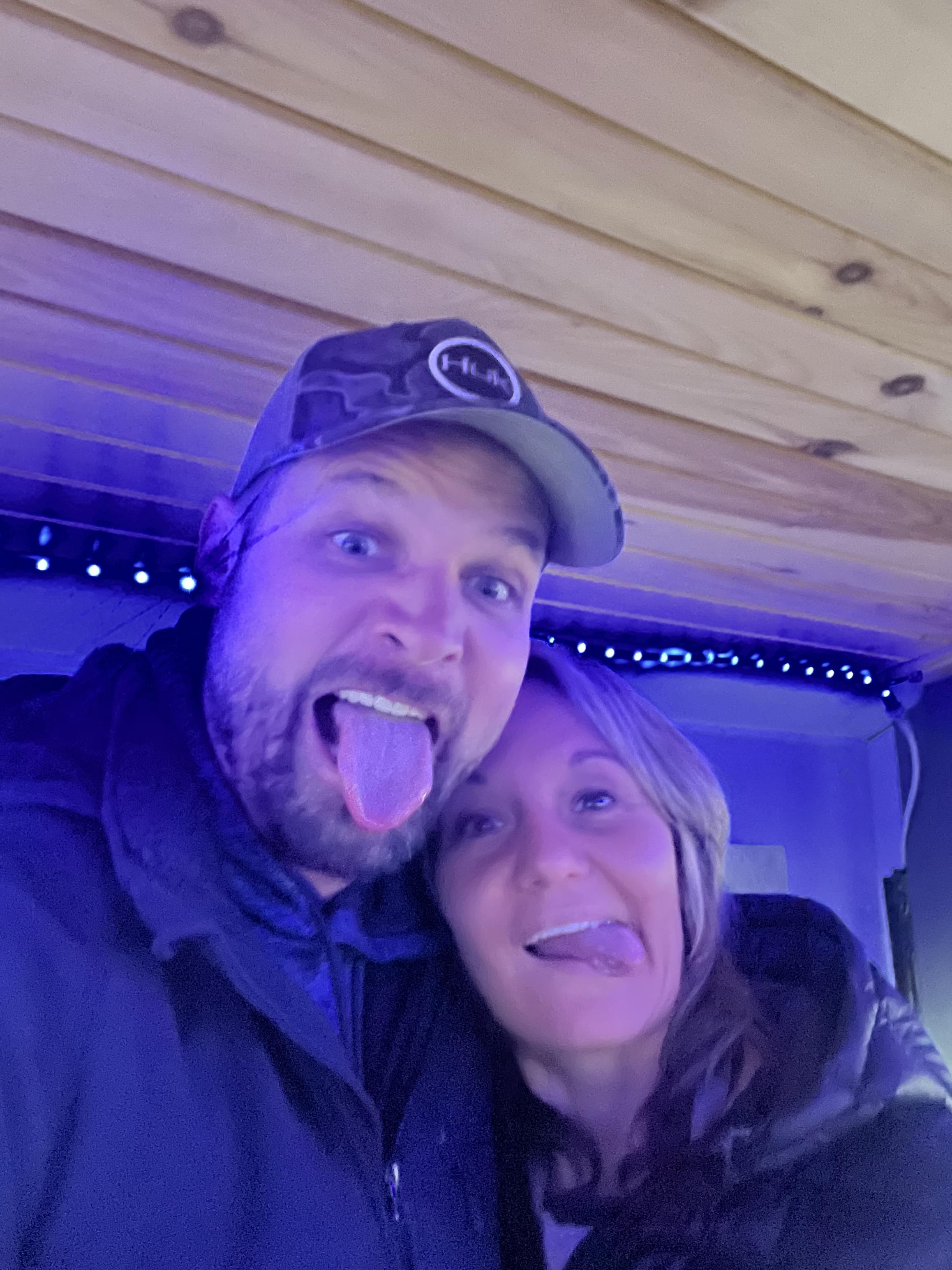 A man and woman taking a selfie