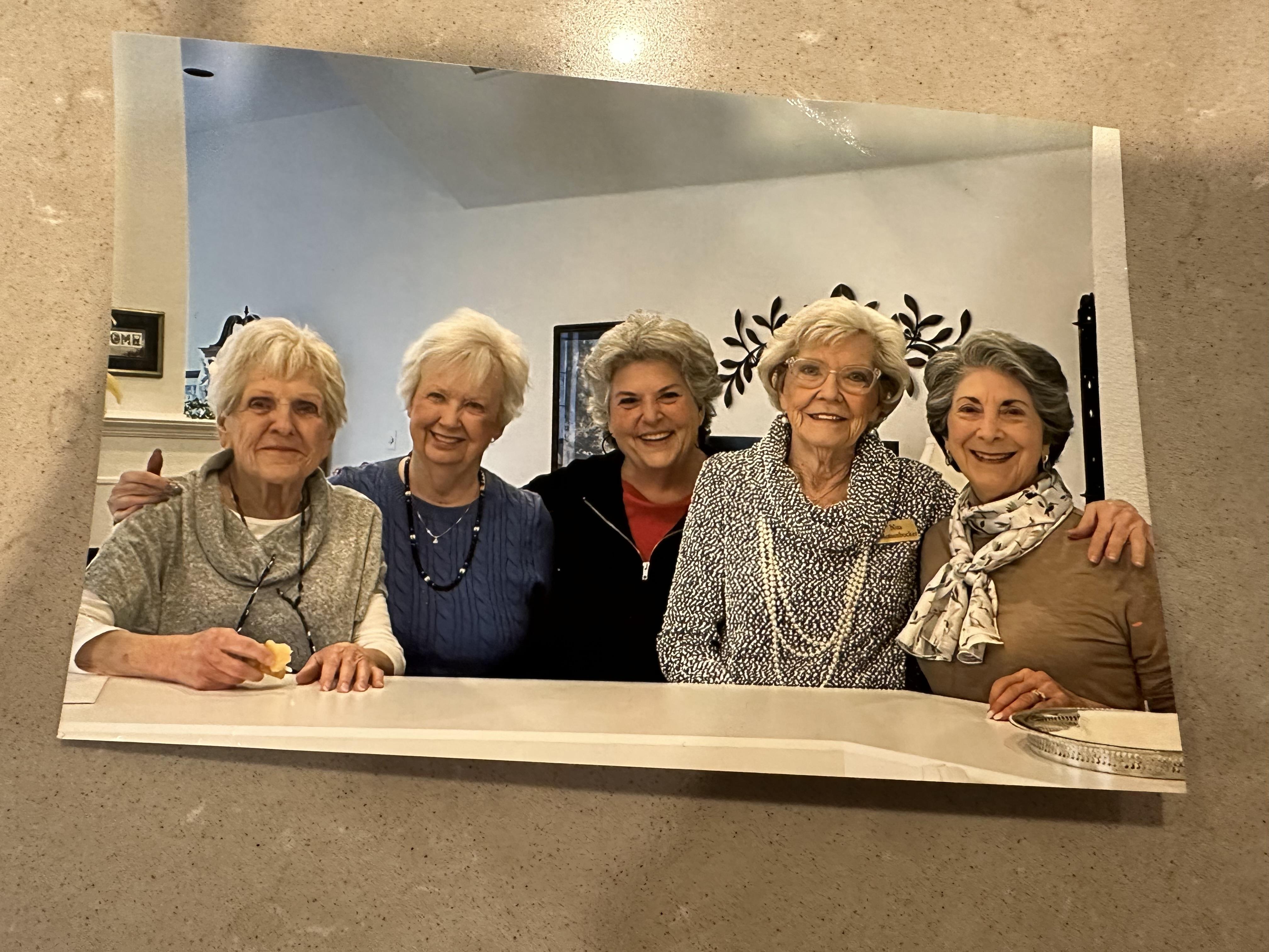 A group of women posing for a photo