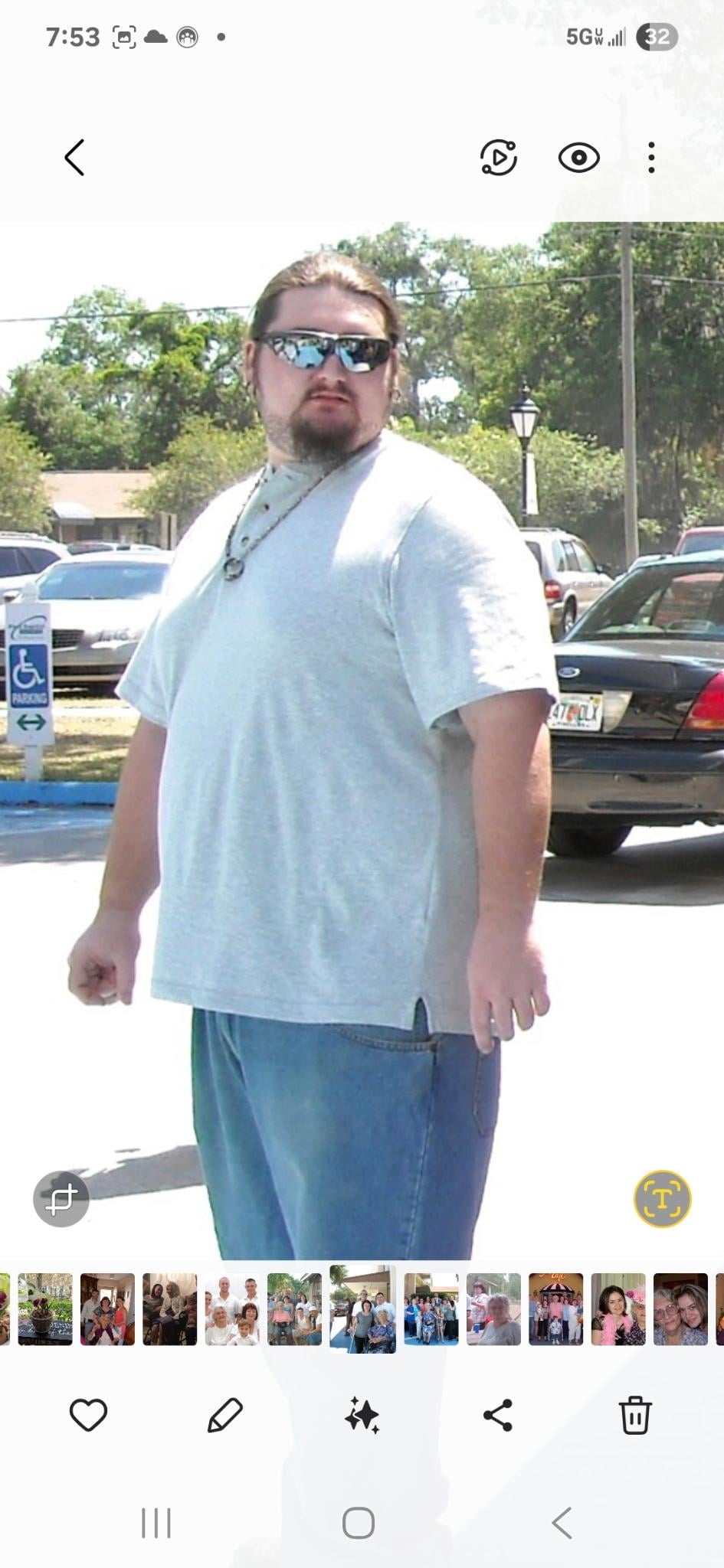A man standing in a parking lot