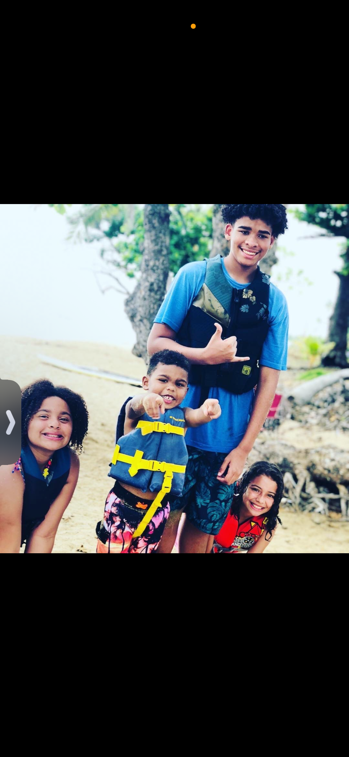A group of kids posing for a picture