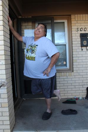 A man standing in front of a door