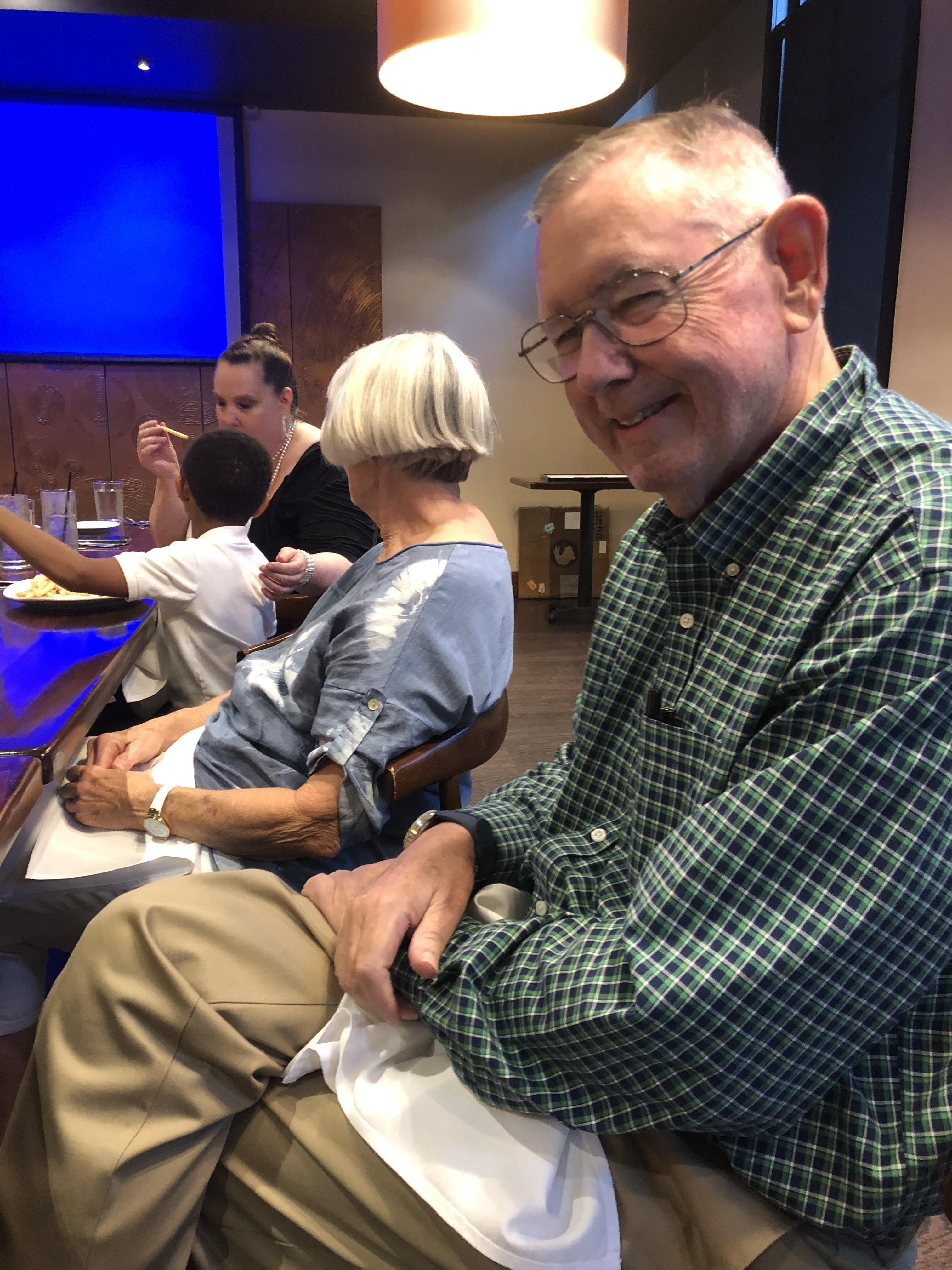A group of people sitting at a table