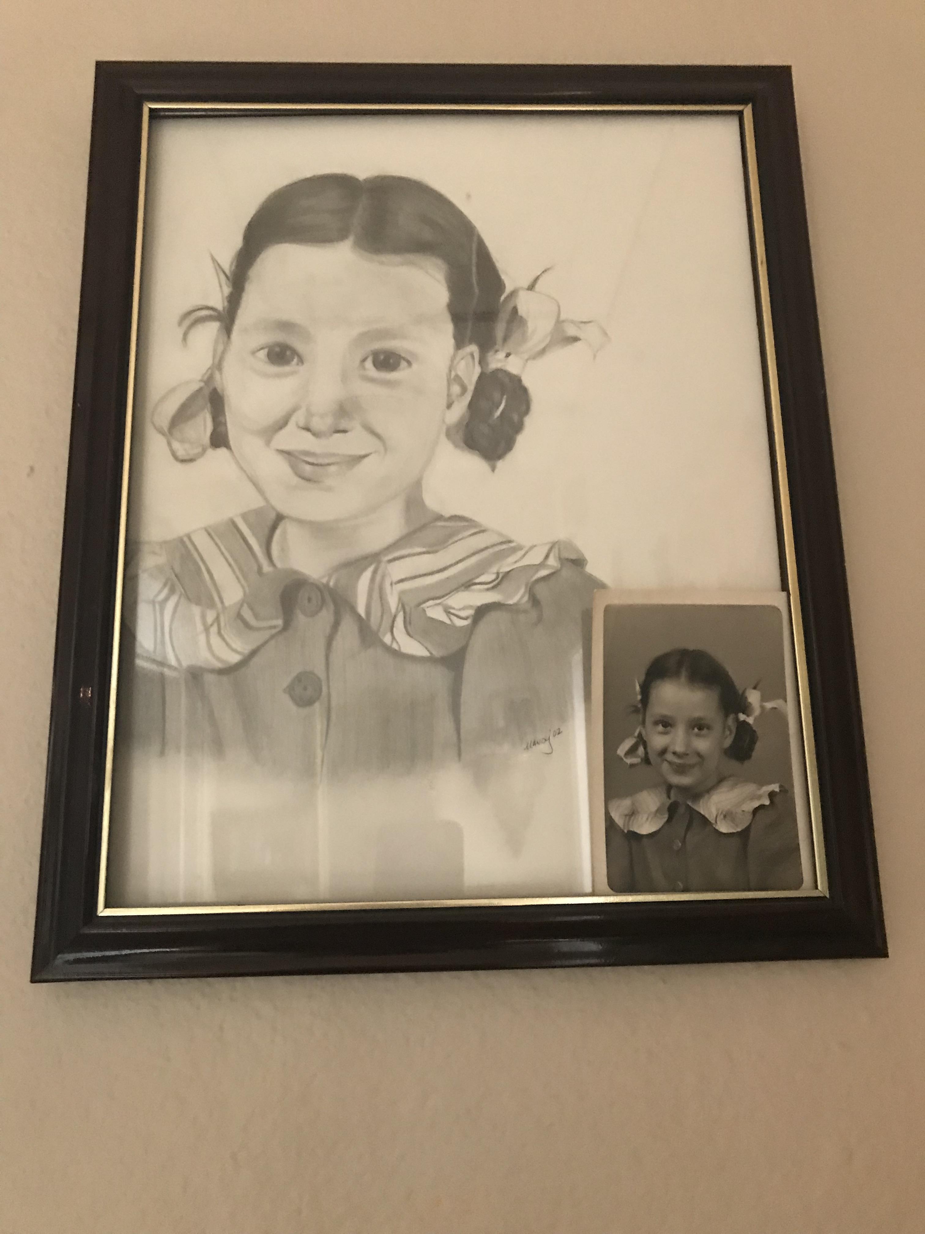 A framed portrait depicts a joyful young girl, showcasing her innocence and charm.
