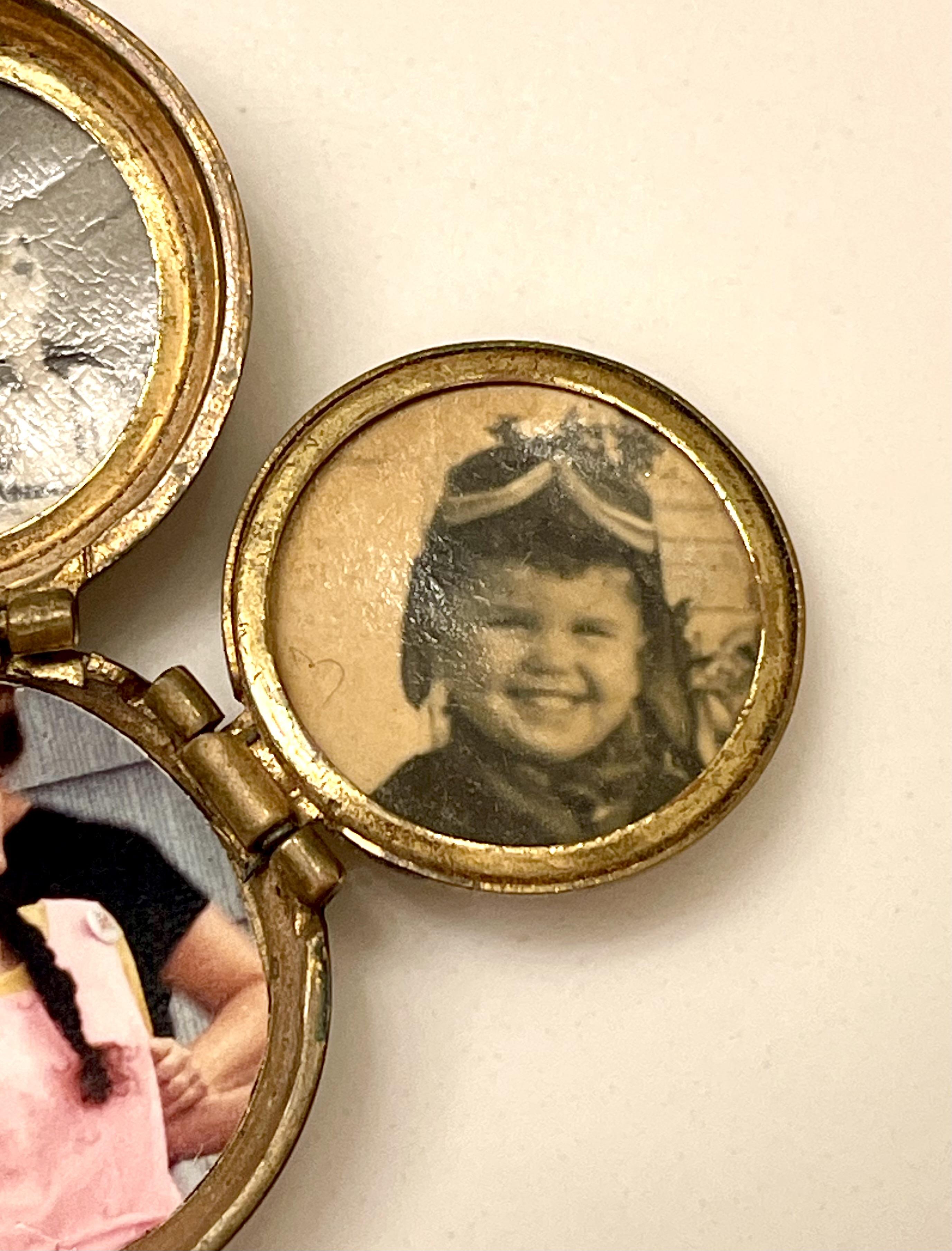 A locket opens to reveal a joyful childhood portrait of a child in aviator goggles.