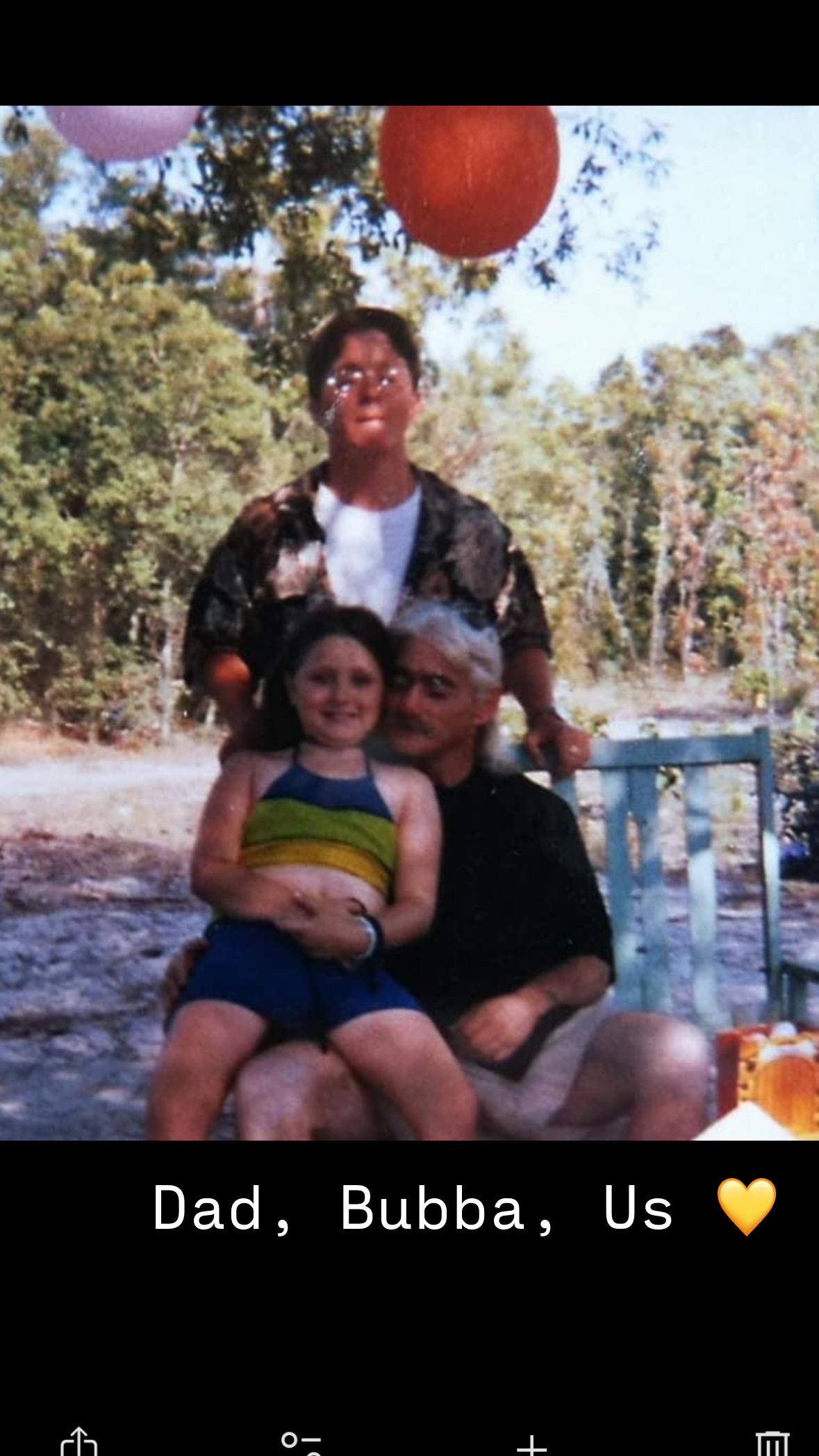 A joyful family spends quality time together outdoors, enjoying the beautiful summer day.