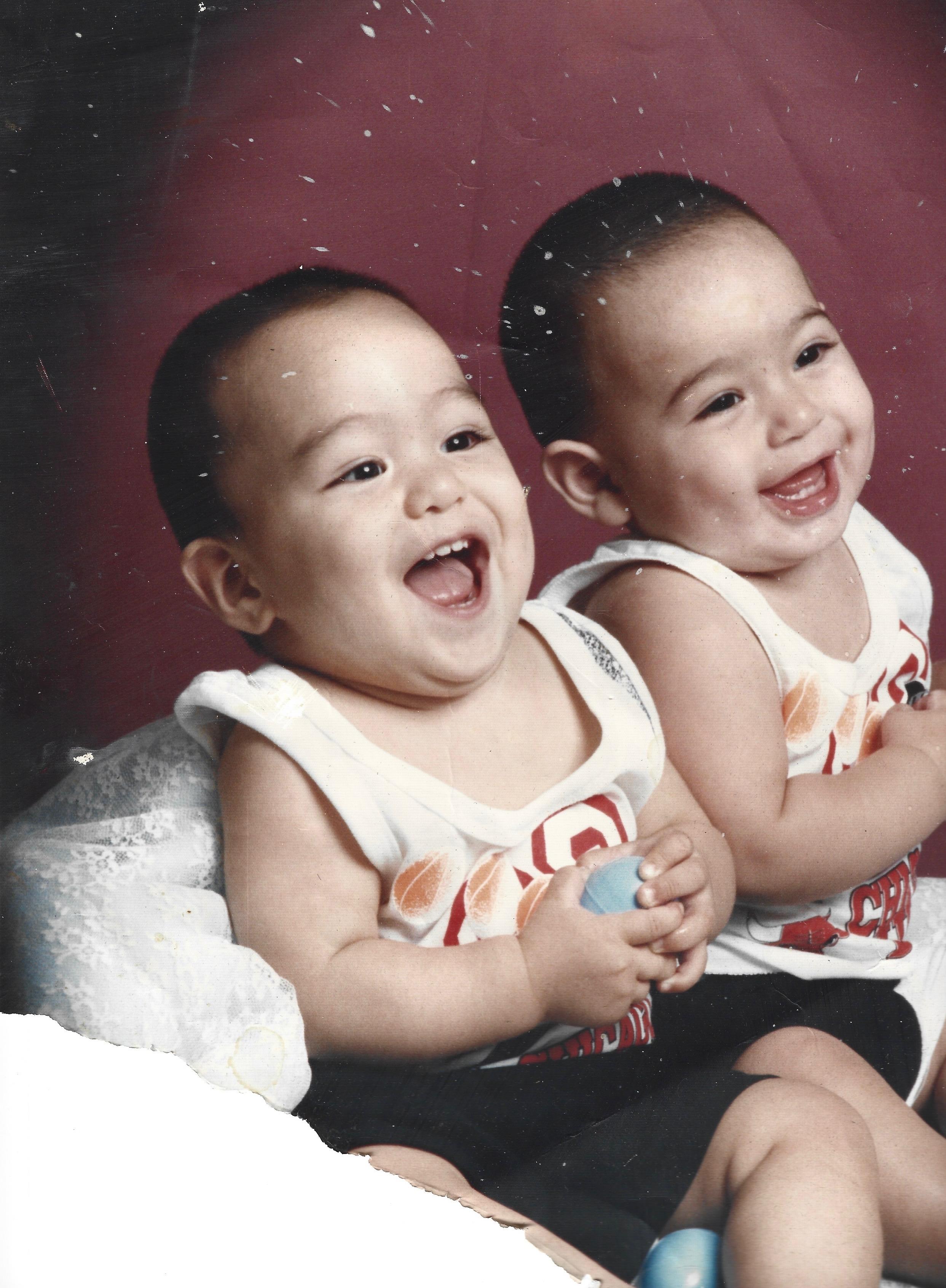 A couple of babies laughing