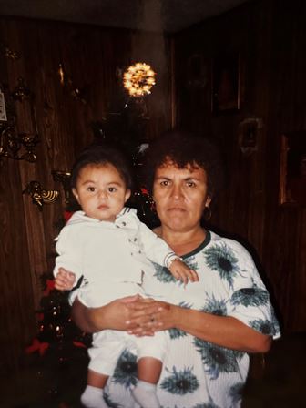 A woman holding a baby