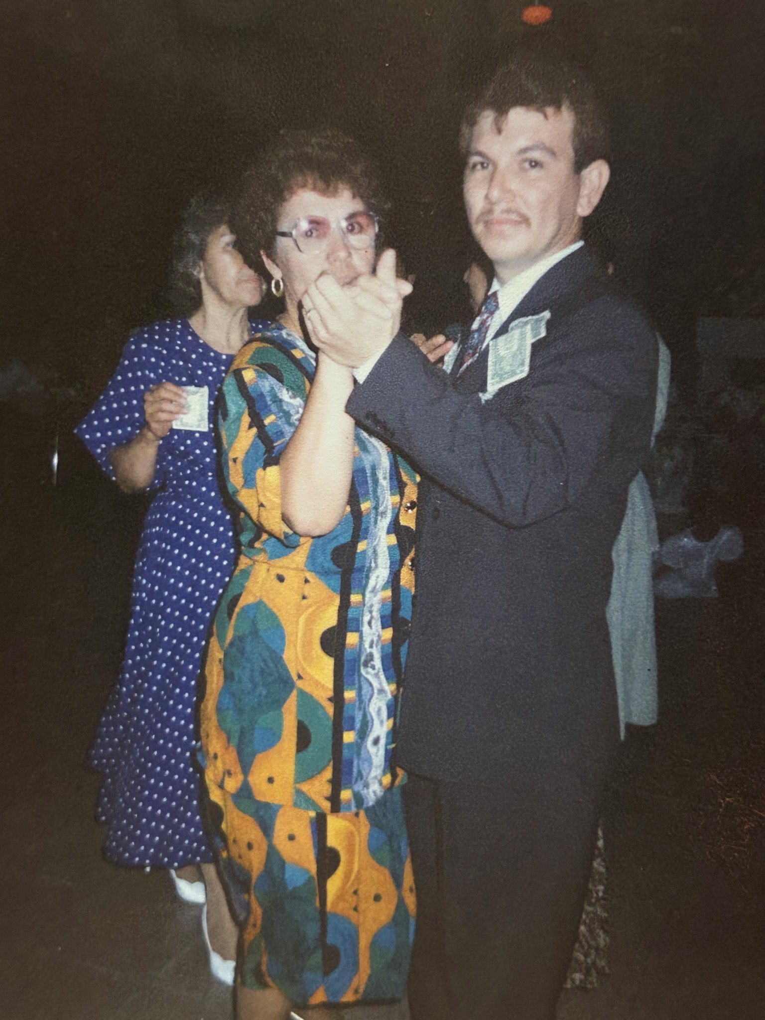 A man and woman posing for a picture