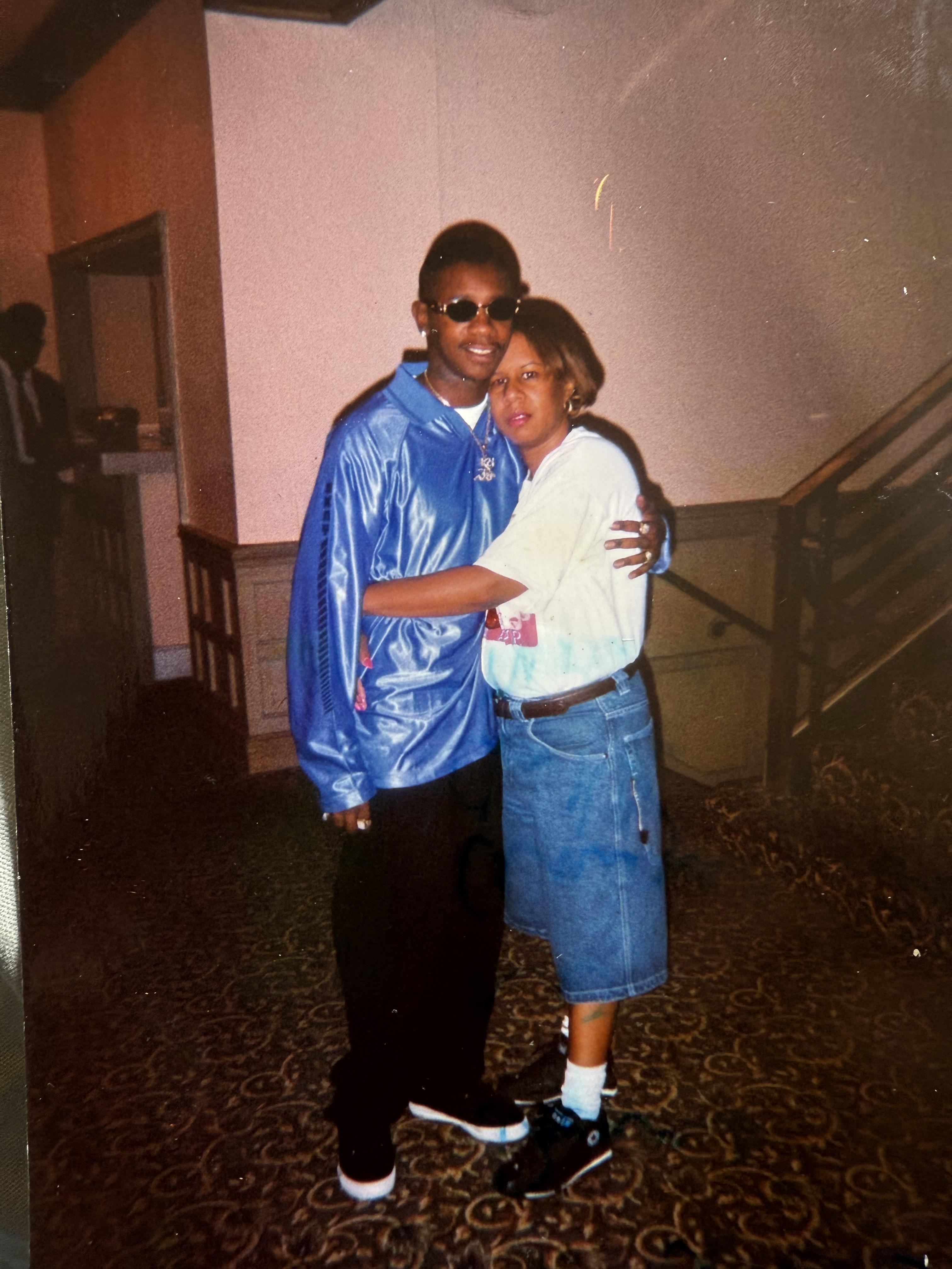 A man and woman posing for a picture