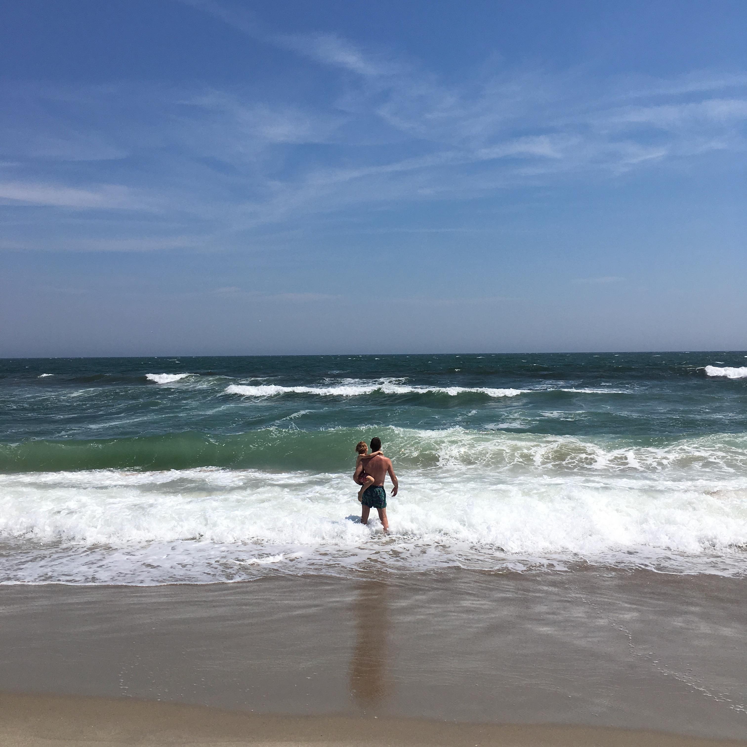 A man and woman on a beach
