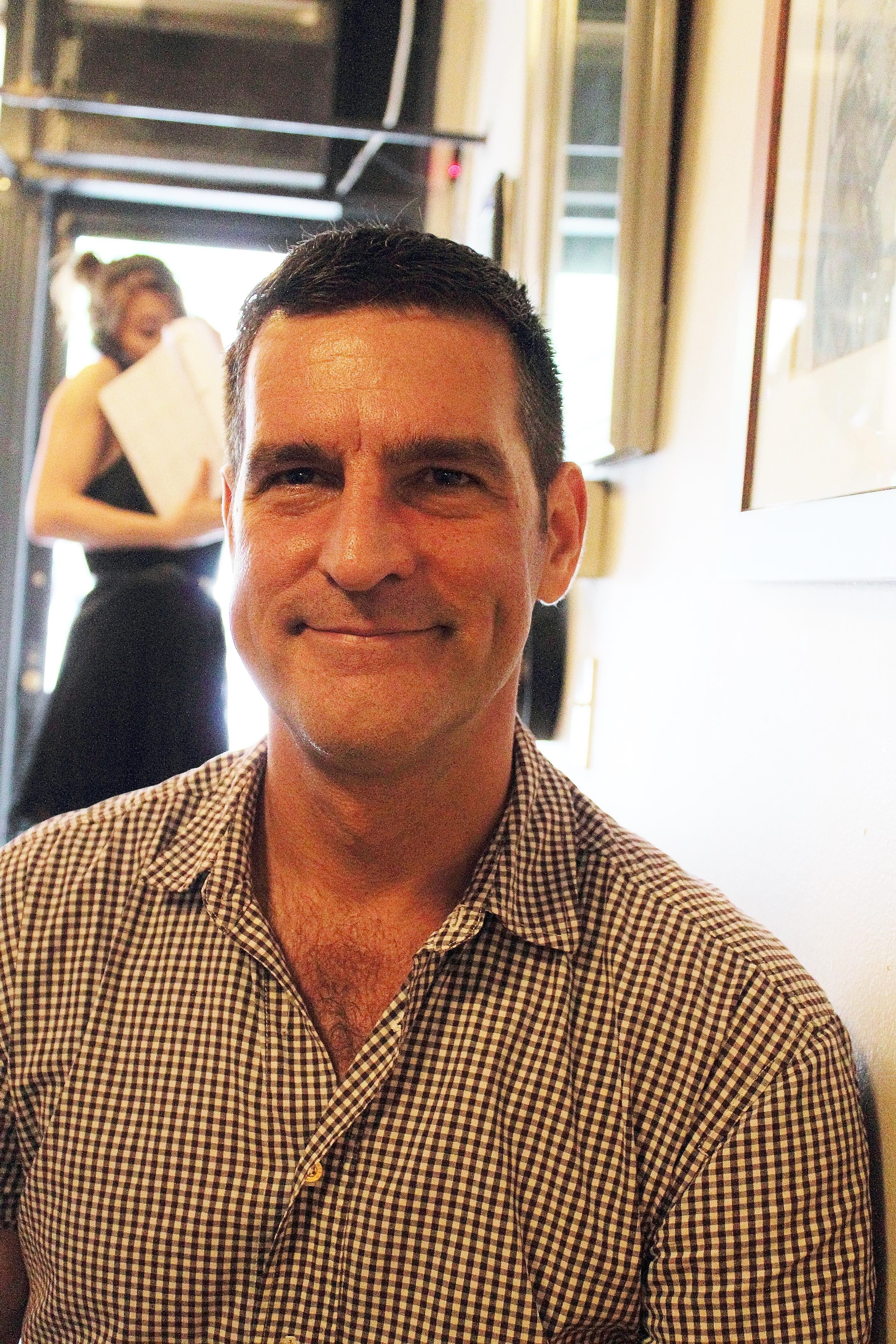 A man smiling at camera