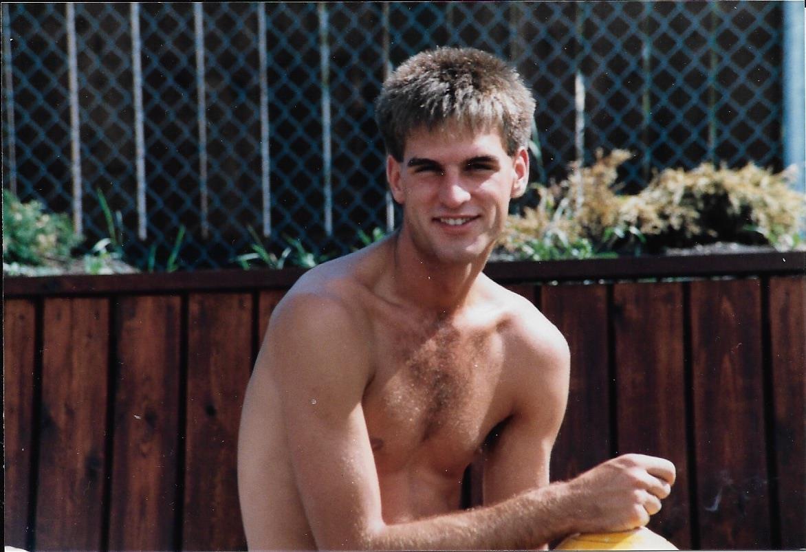 A man smiling at the camera