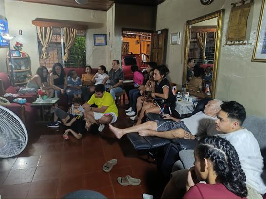 A group of people sitting in a room